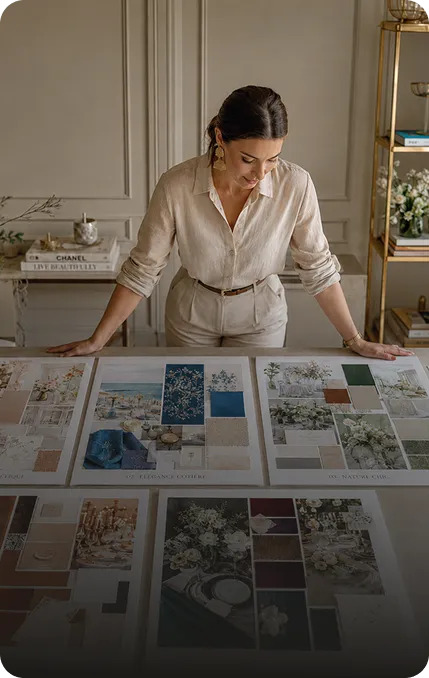 A planner reviewing wedding trend boards